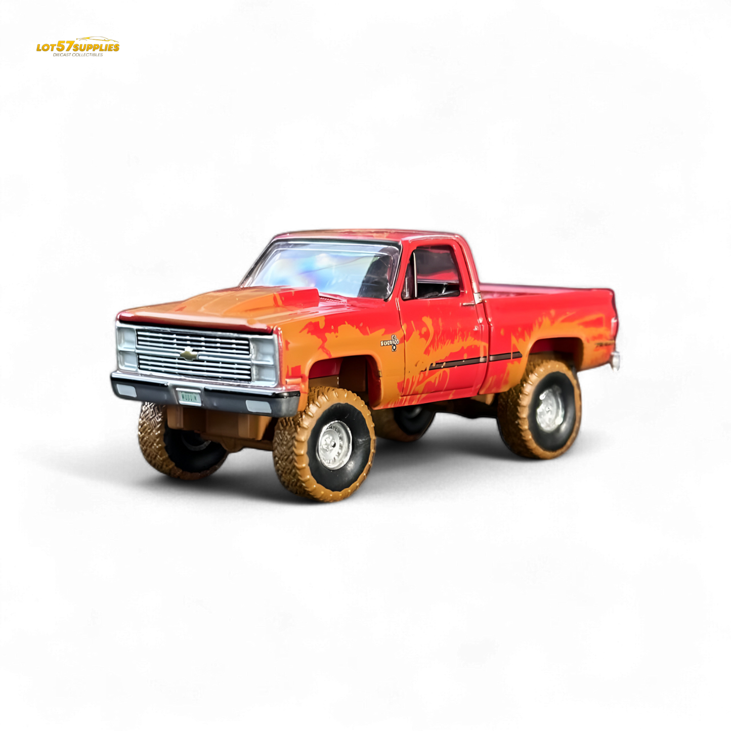 Auto World 1983 Chevrolet Silverado K10 4x4 Muddy LIFTED Squarebody 1:64